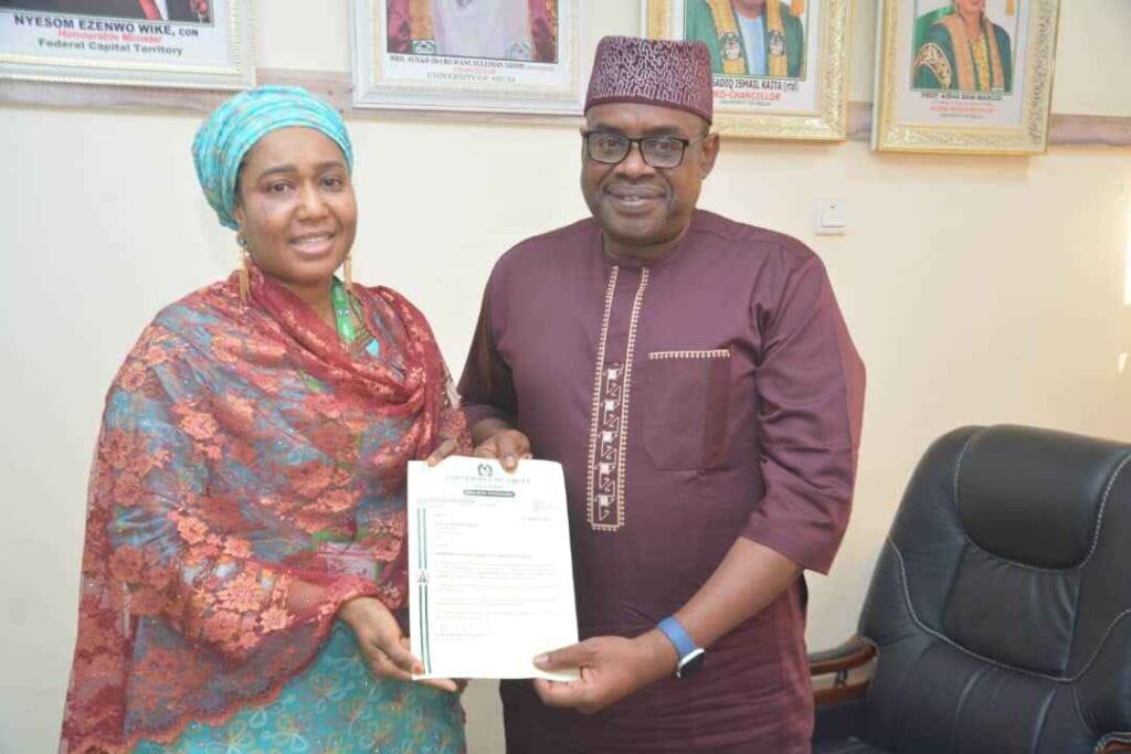 Photo of Prof. Aisha Maikudi with the Chairman of UNIABUJA Governing Air Vice-Marshal Saddiq Ismaila Kaita (Rtd) during presentation of letter of appointment to Maikudi as the seventh substantive Vice-Chancellor of University of Abuja on December 31, 2024