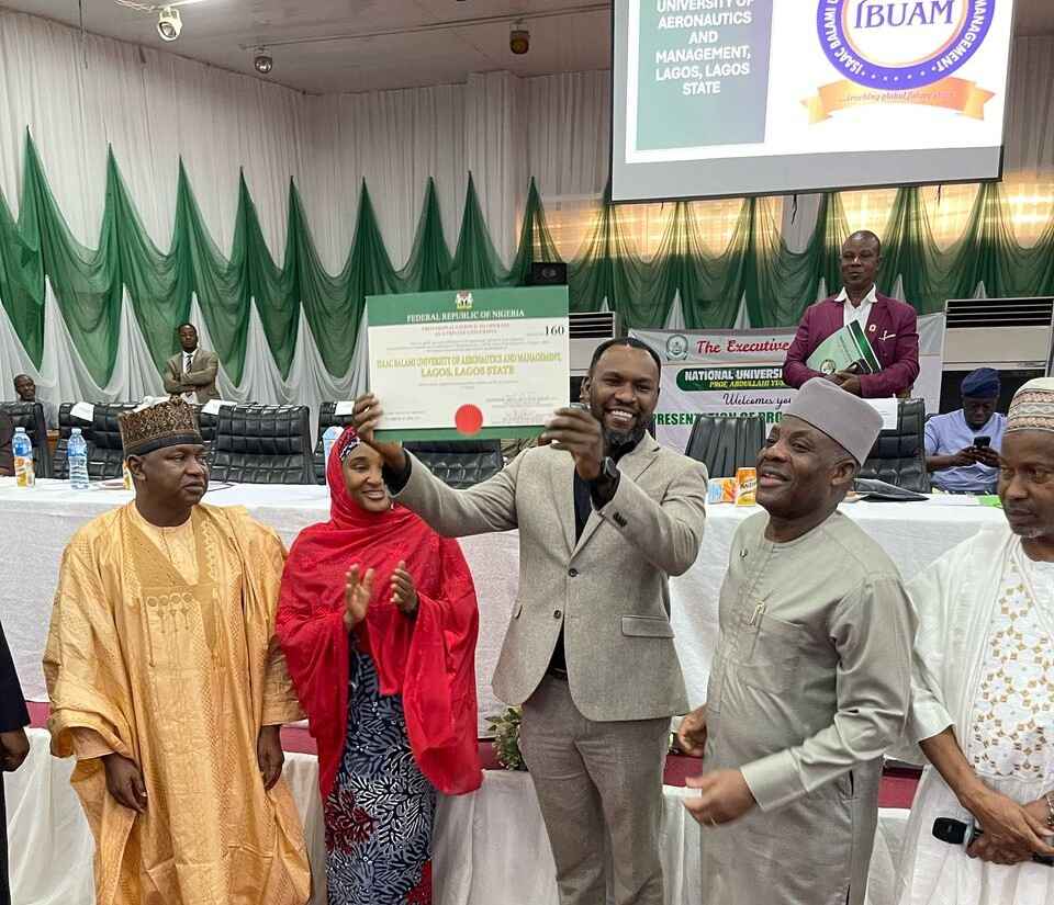 Engr Isaac Balami displays approval certificate of Isaac Balami University of Aeronautics and Management in Abuja