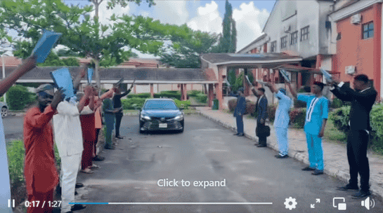 photo shows students holding their project and forma guard of honour for their external supervisor at FUTA, ondo state, Nigeria
