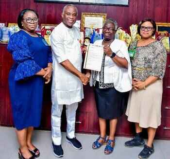 UCH School of Nursing officials show off the NUC approval to award BNSc in Nursing